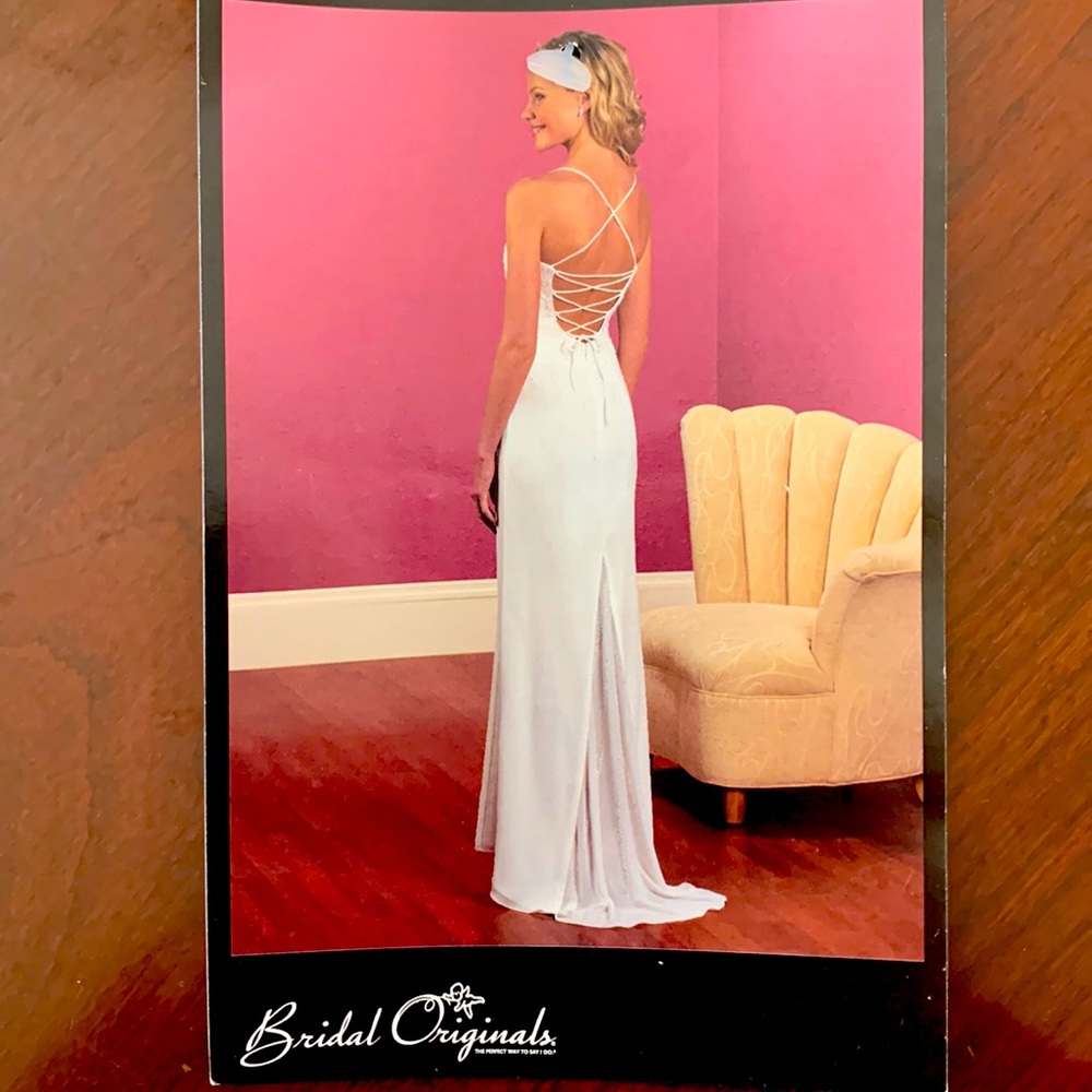 Wedding dress, never worn. Perfect for summer wedding